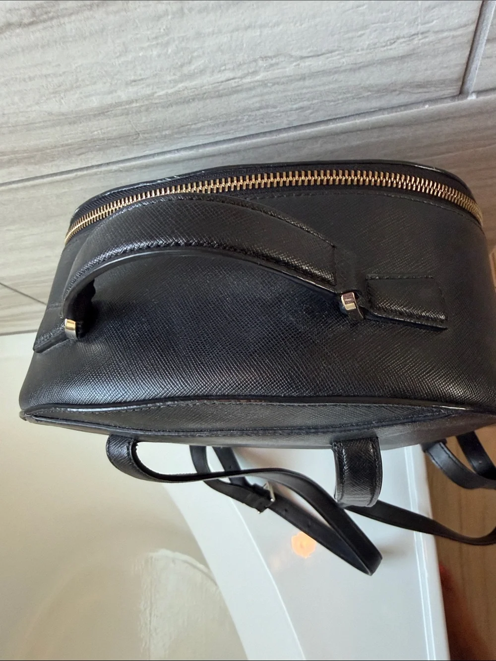 kate spade black saffiano leather backpack with silver-tone hardware